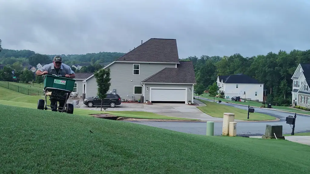 Lush green lawn in Greenville, SC — Turf 212 lawn care services